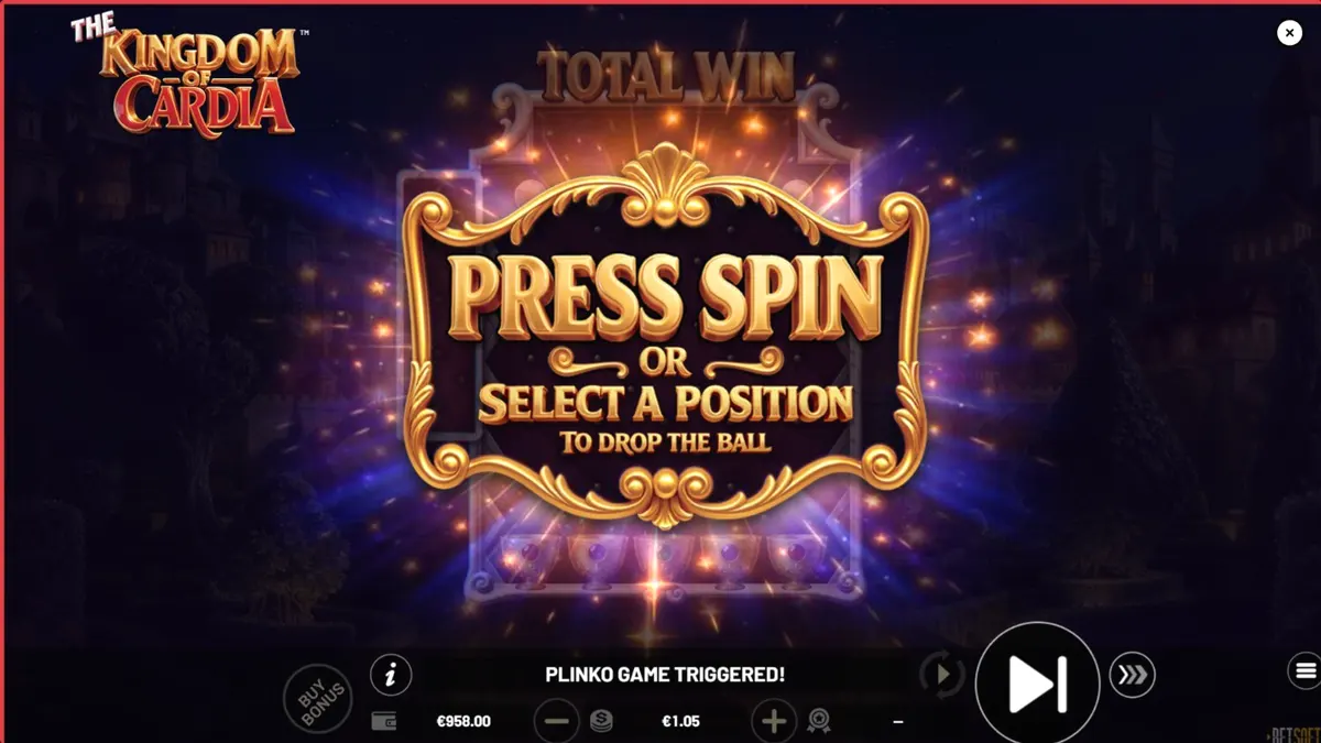 Tampilan layar permainan slot The Kingdom of Cardia dari Betsoft, menampilkan gulungan dengan simbol kartu dan karakter fantasi di latar belakang taman yang penuh warna.